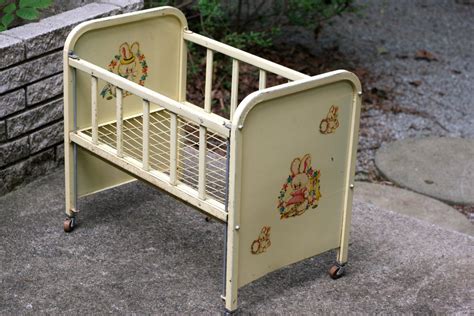 antique metal doll cradle with music box|VINTAGE 50'S AMSCO METAL DOLL BED/CRADLE W/ .